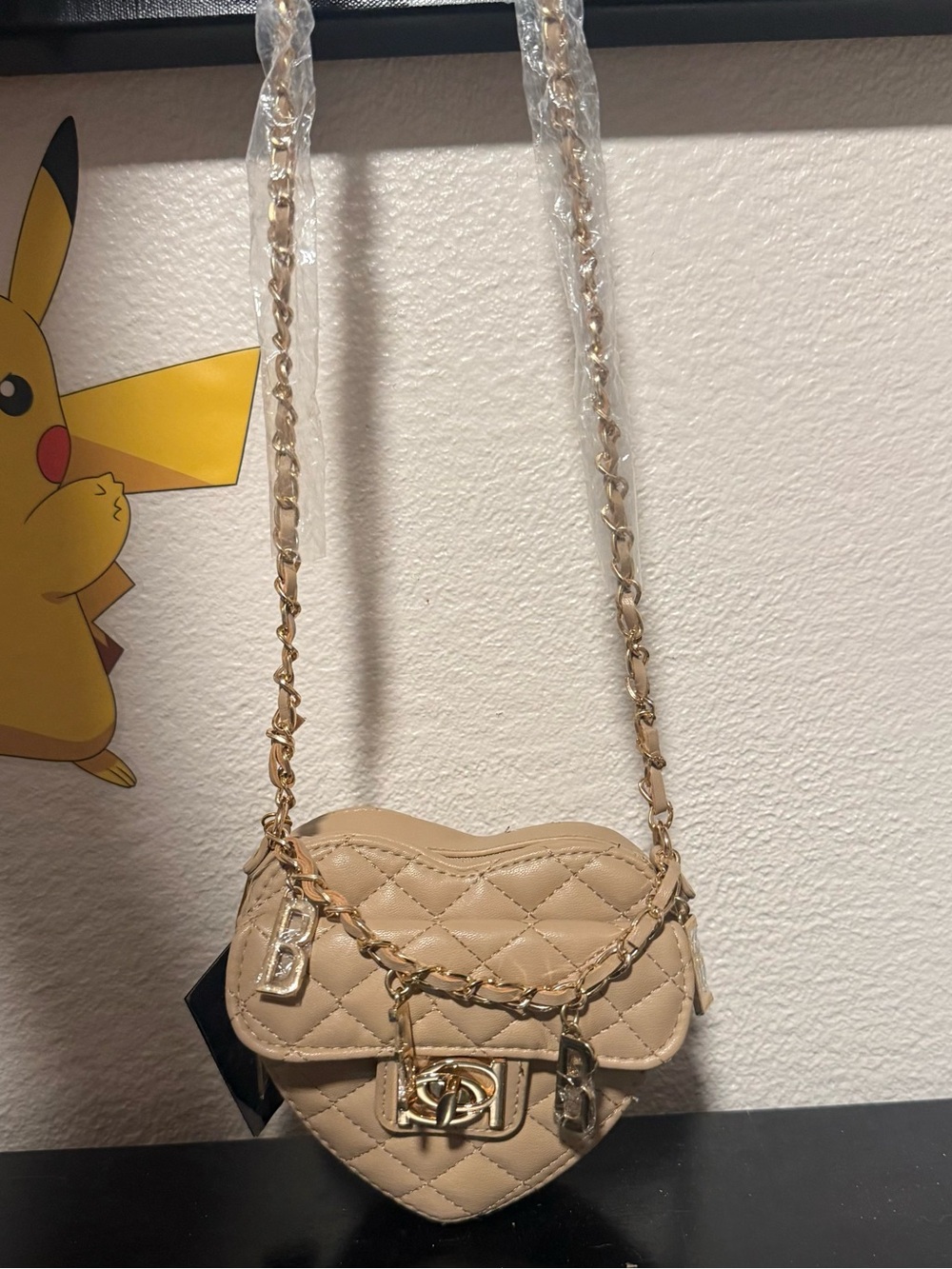 BEBE heart shaped quilted cross body